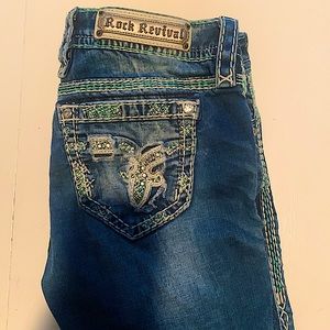 Rock Revival modelo jeans.color:nancy,teal and white stitching.Size:29 straight.